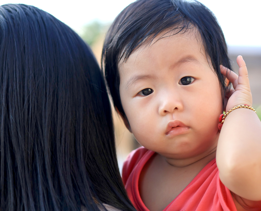 Baby girl with mother